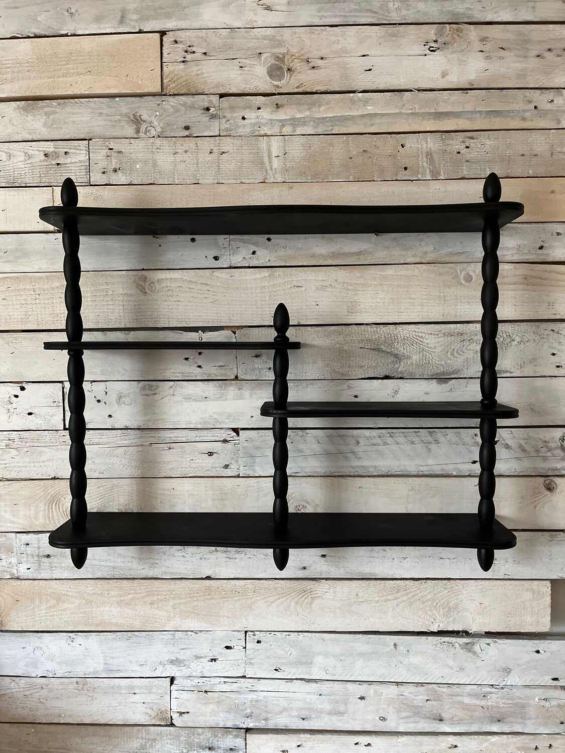 Blackened Napoleon shelf