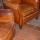 2 leather club armchairs from the 1950s