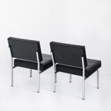 Pair of vintage low armchairs in chrome metal and skaï, Spain 1970