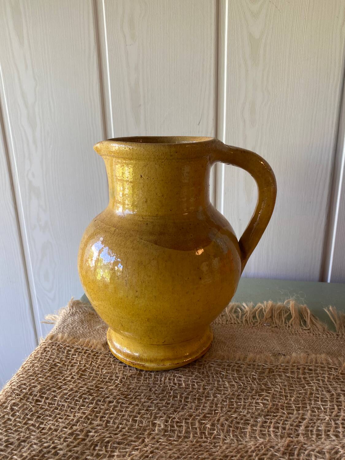 Yellow terracotta carafe