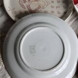 Vintage mismatched earthenware dessert plates with red patterns