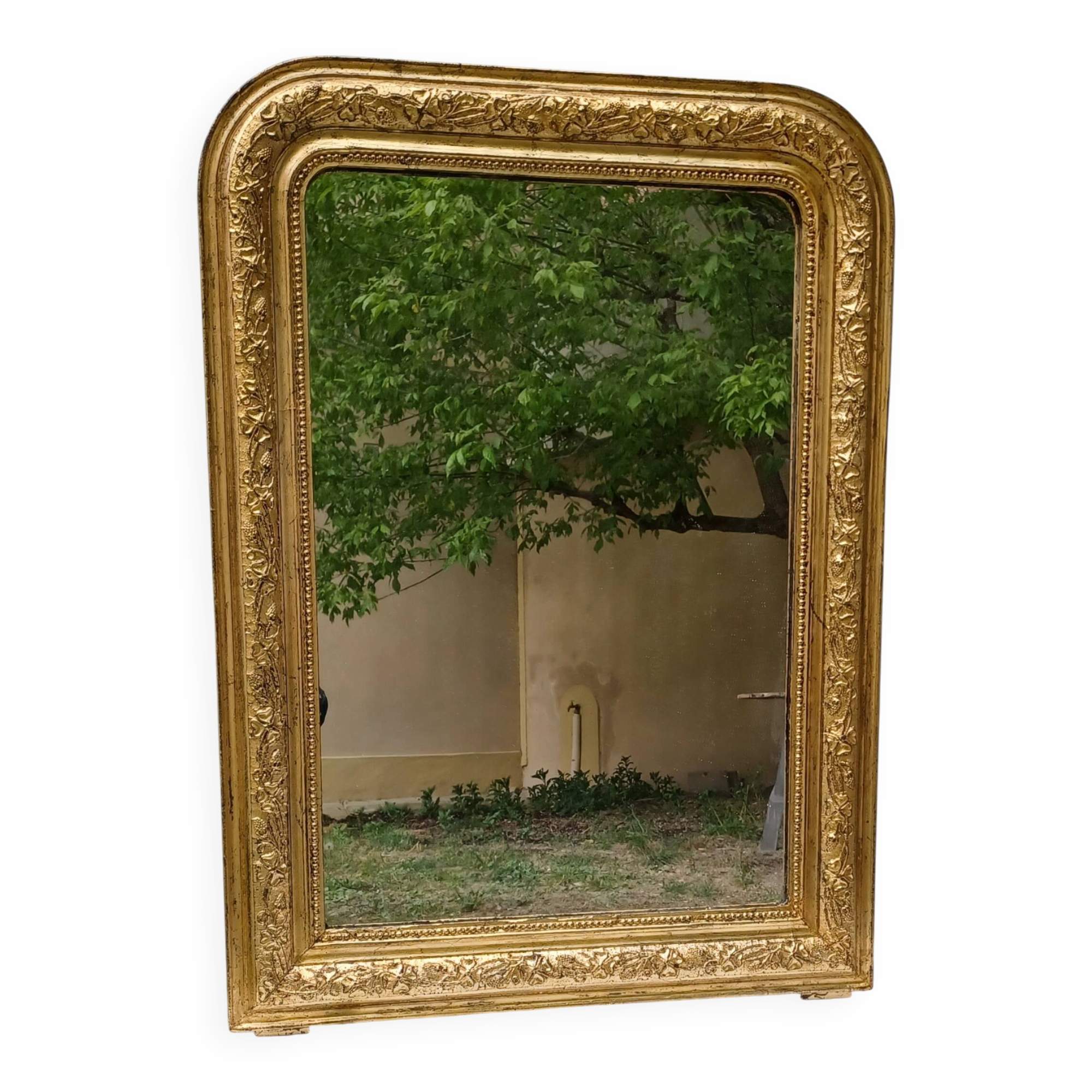 Golden mirror in louis-philippe style around 1870