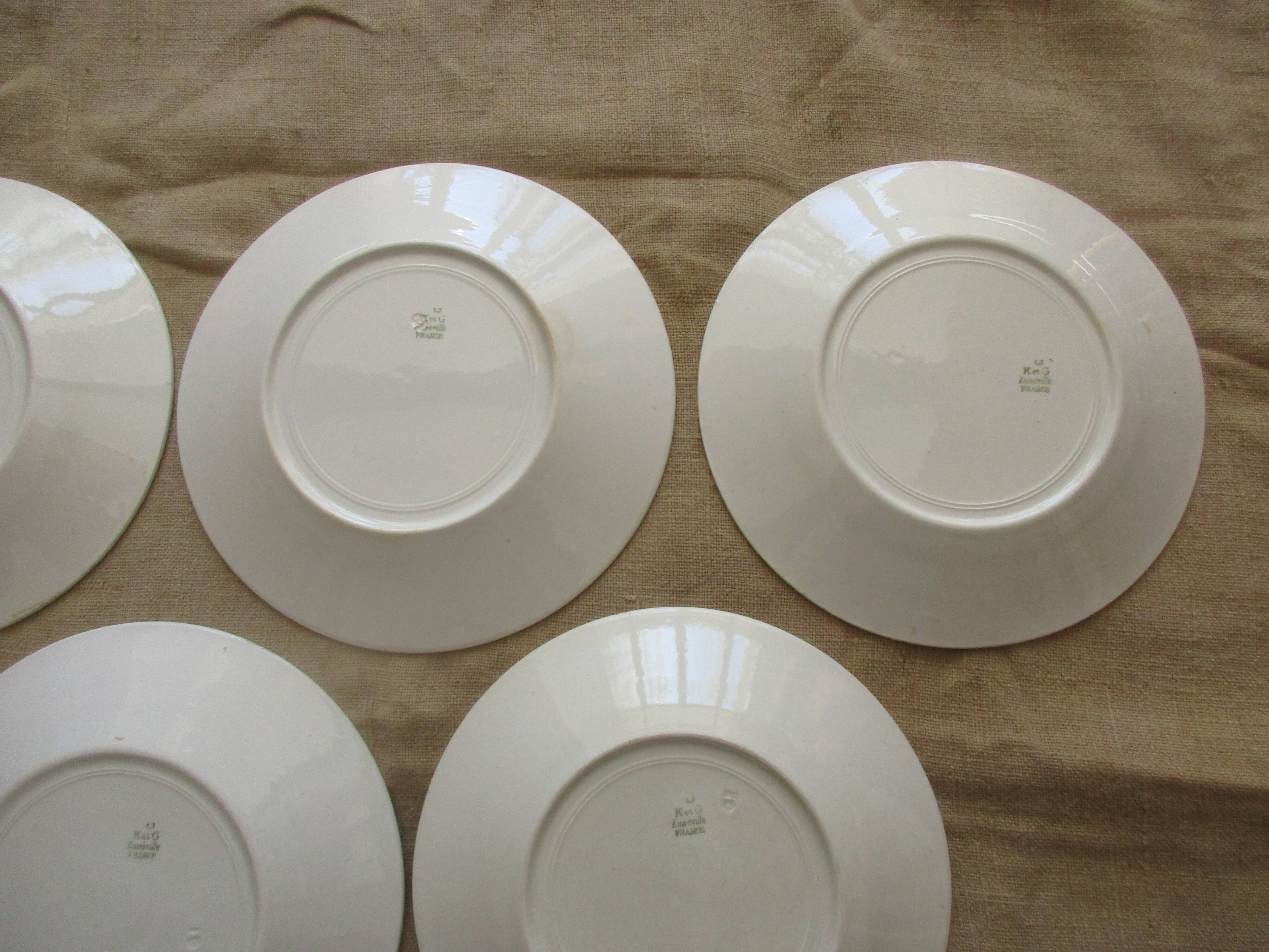 6 plates a decor floral and garland faiencerie de luneville