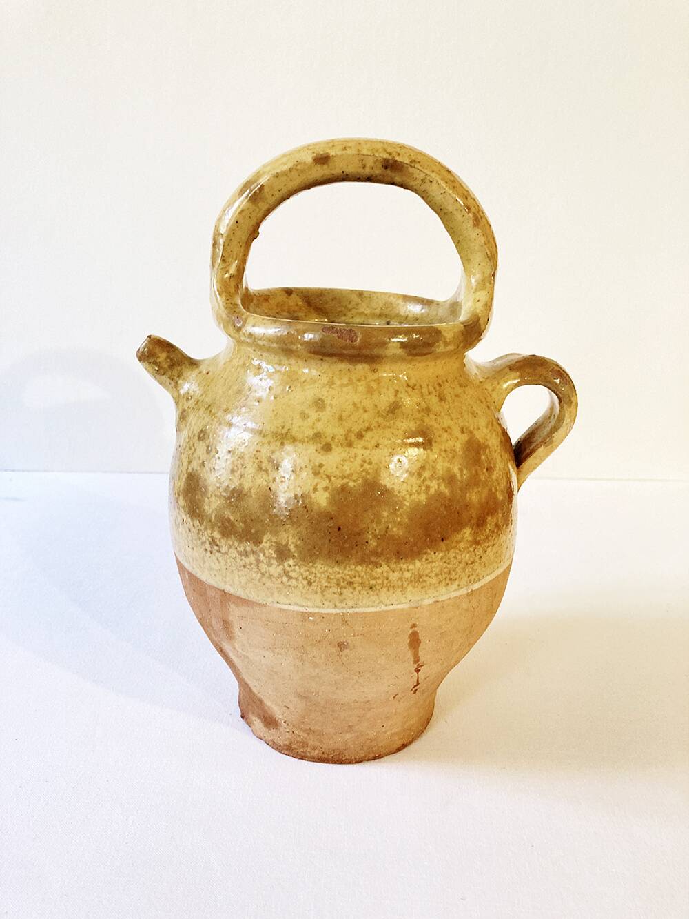 Antique Provençal jug / goat in yellow enamelled stoneware