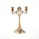Art Nouveau brass candlestick with floral ornamentation, two arms, European