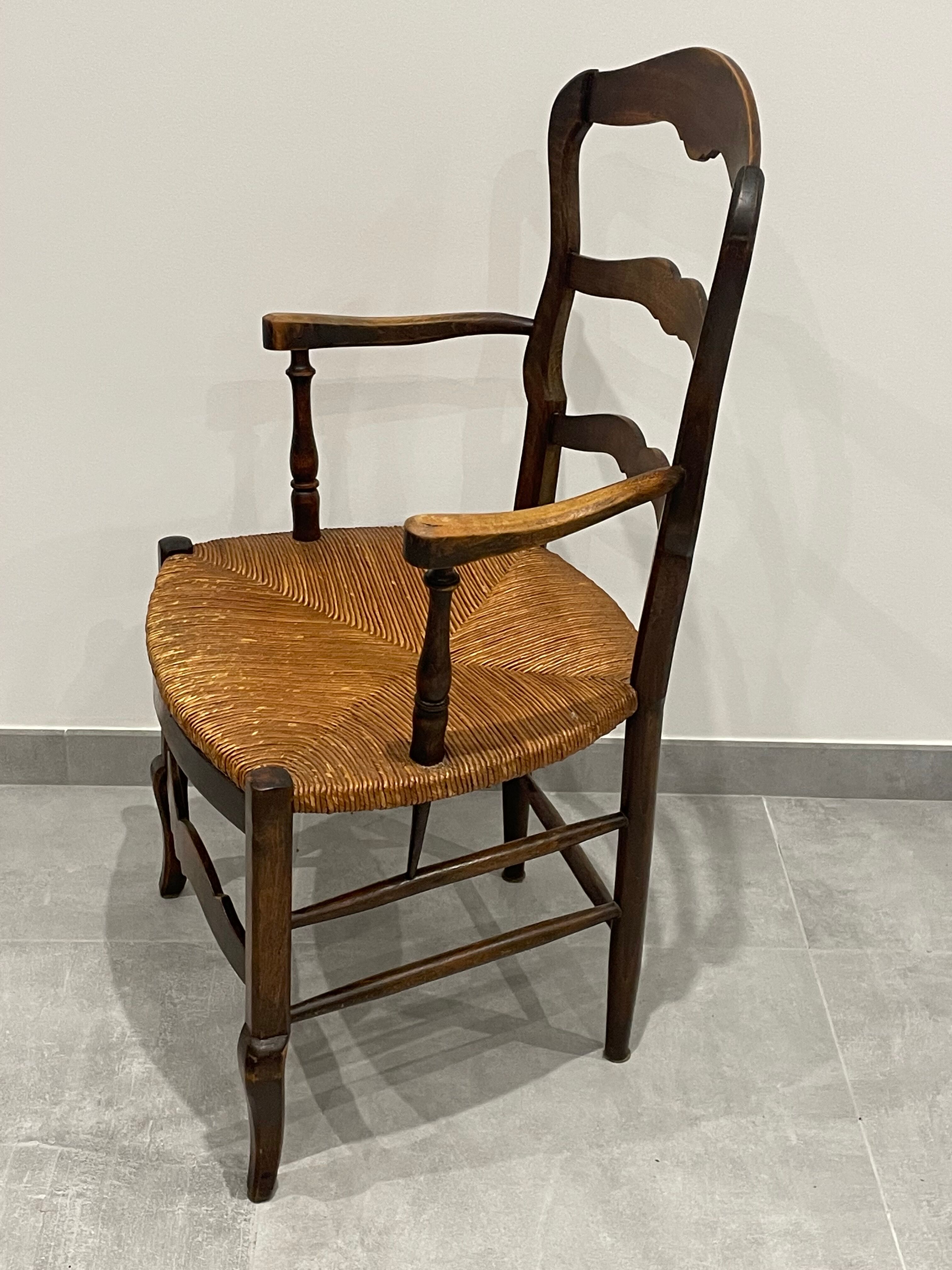 Provencal style straw armchair sometimes called marsh armchair