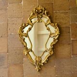 Antique Baroque mirror with gilded metal panels