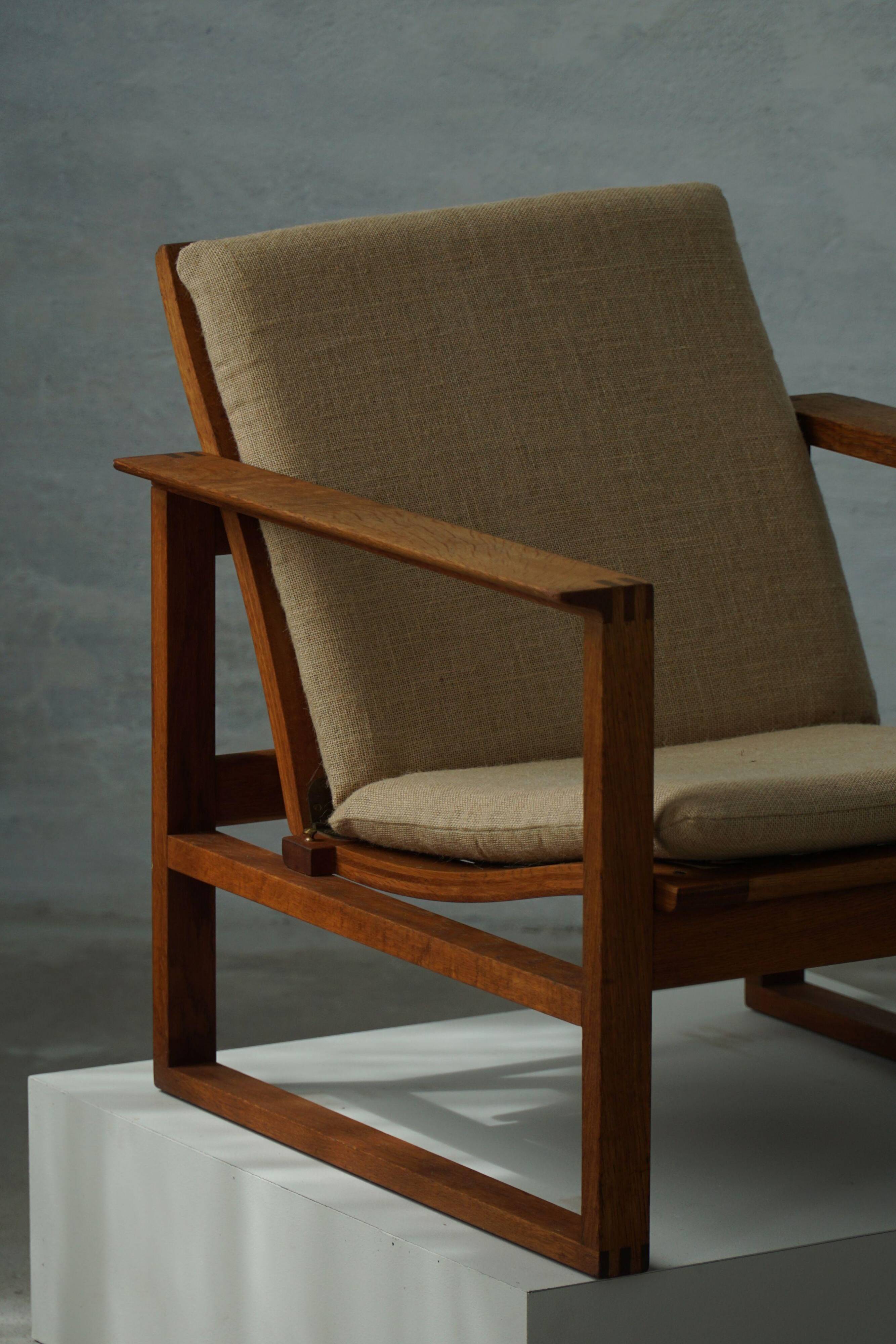 Børge Mogensen, a pair of BM2256 lounge chairs in oak and jute, Denmark, 1960s.