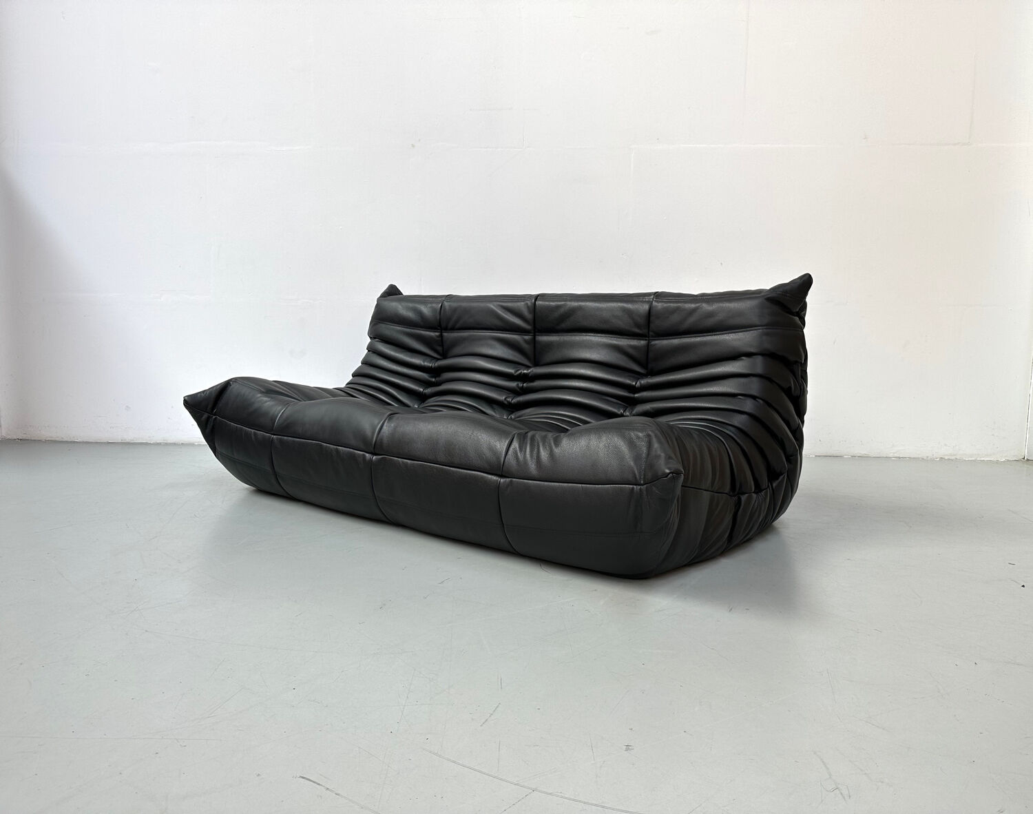 Togo 3-seater in Black Leather designed by M. Ducaroy for Ligne Roset