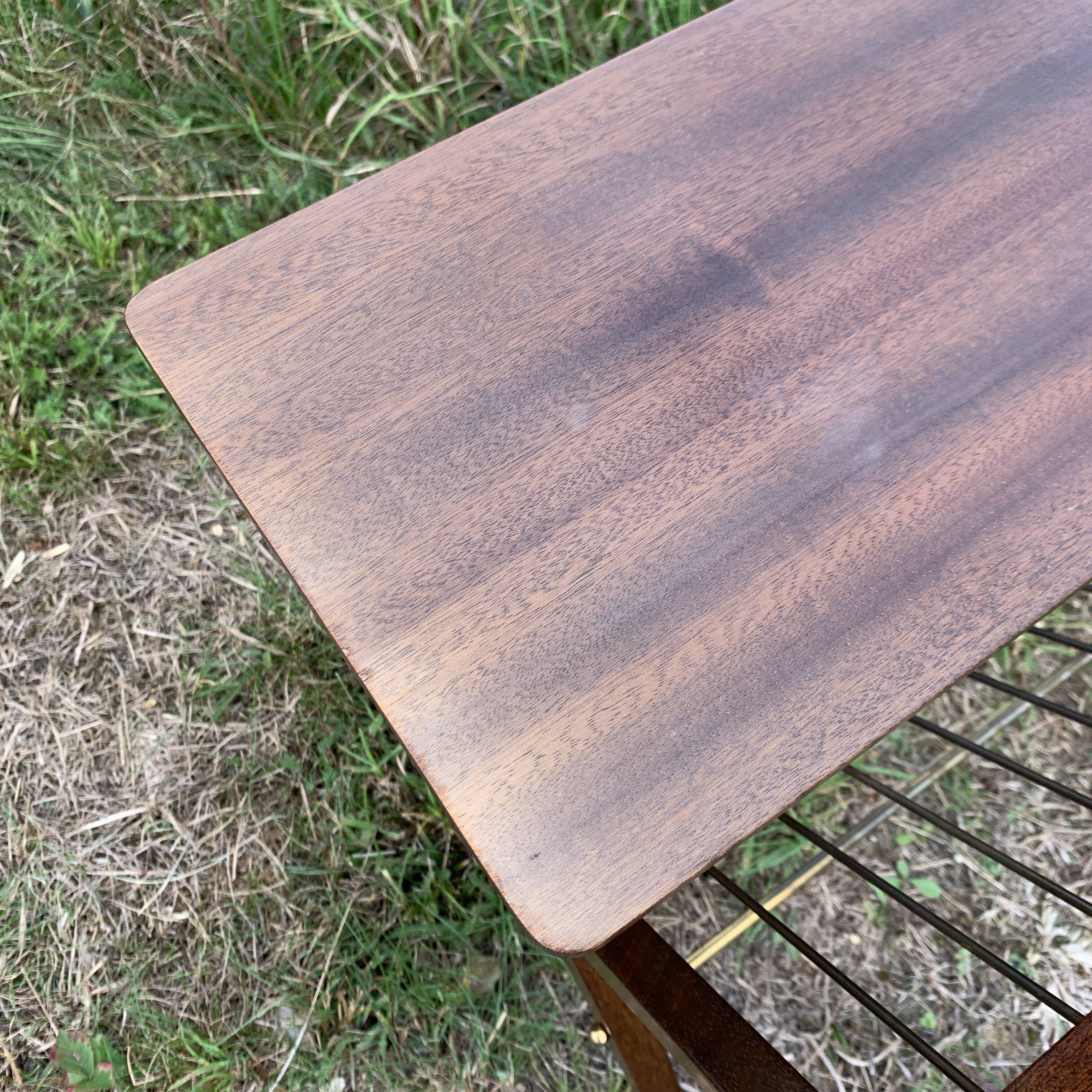 Magazine rack with wooden and gilded brass tablet