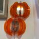 Pair of orange Muno wall lights
