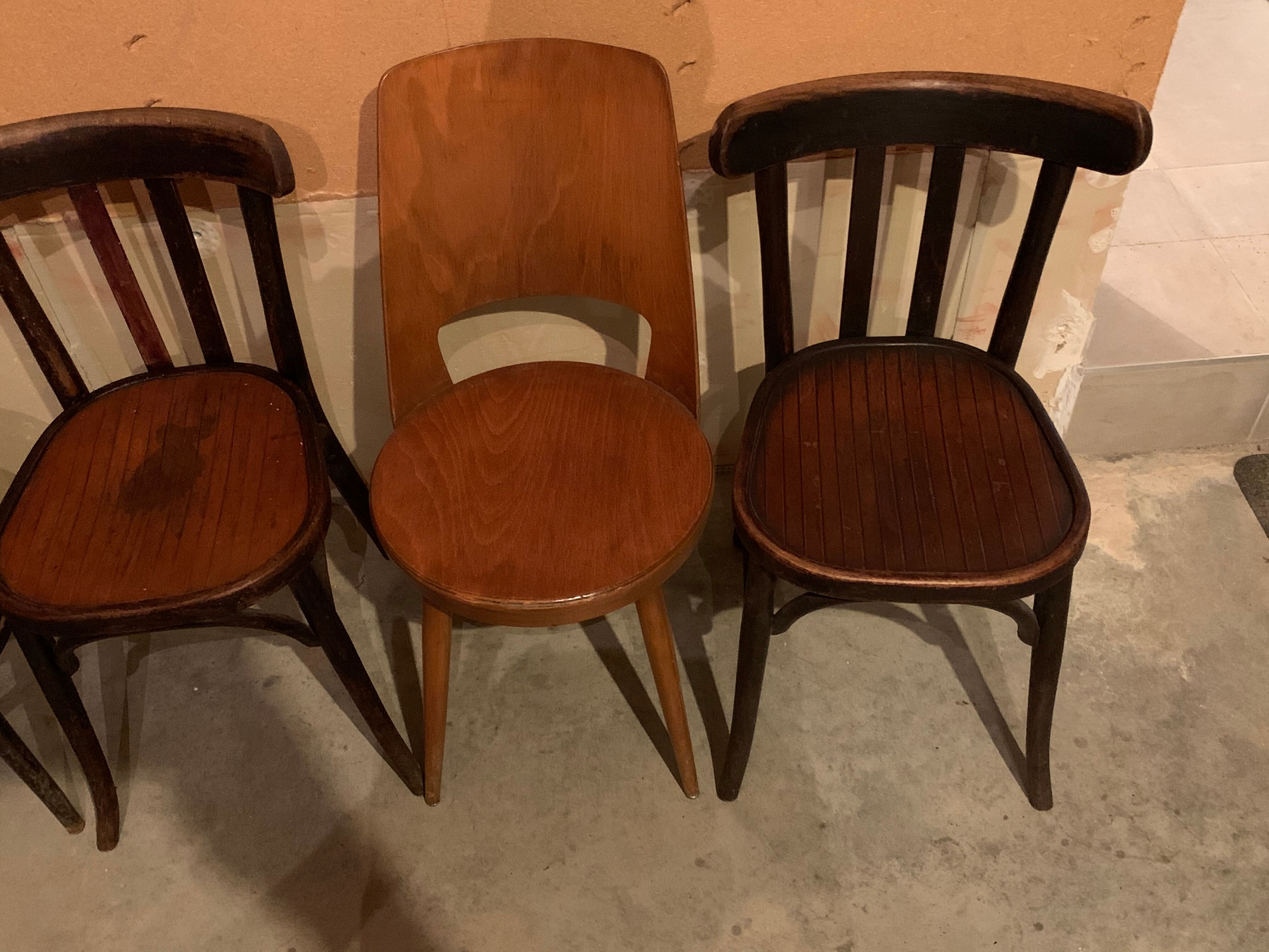 Lot of mismatched bistro chairs