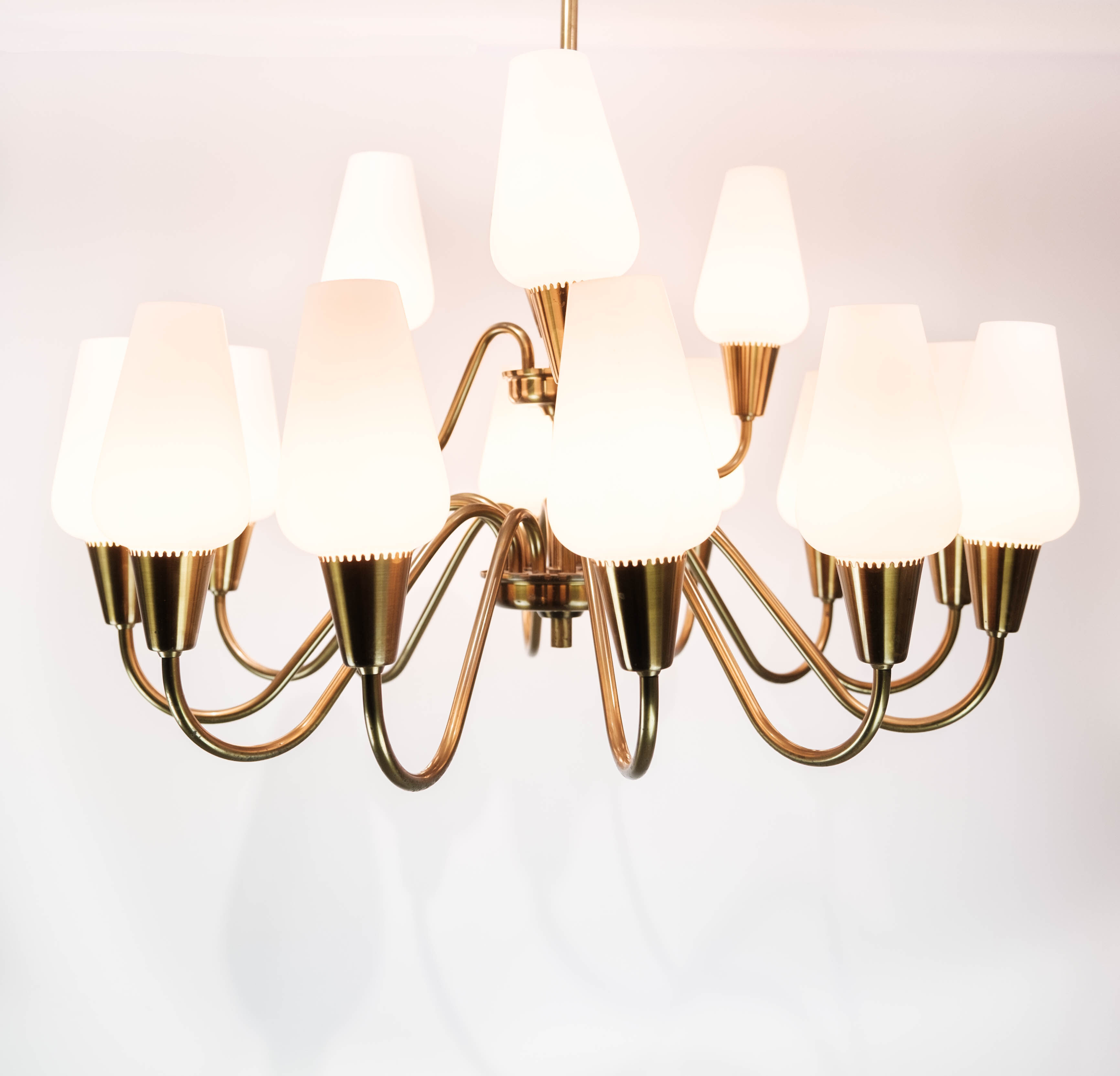 Lamp with arms of brass and glass, of Danish design from the 1950s