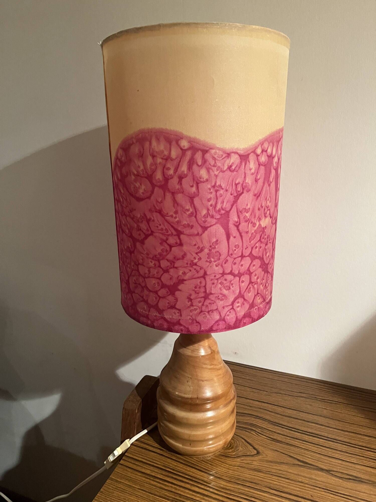 Vintage lamp with a carved wooden base from the 1970s.