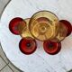 Set of 8 champagne glasses in amber colored glass and garnet 70s
