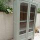 Renovated Art Deco display cabinet in grey-green.