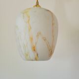 Marbled opaline suspension