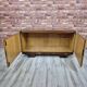 Low sideboard after renovation. Hypnotising veneer and Art Deco style.