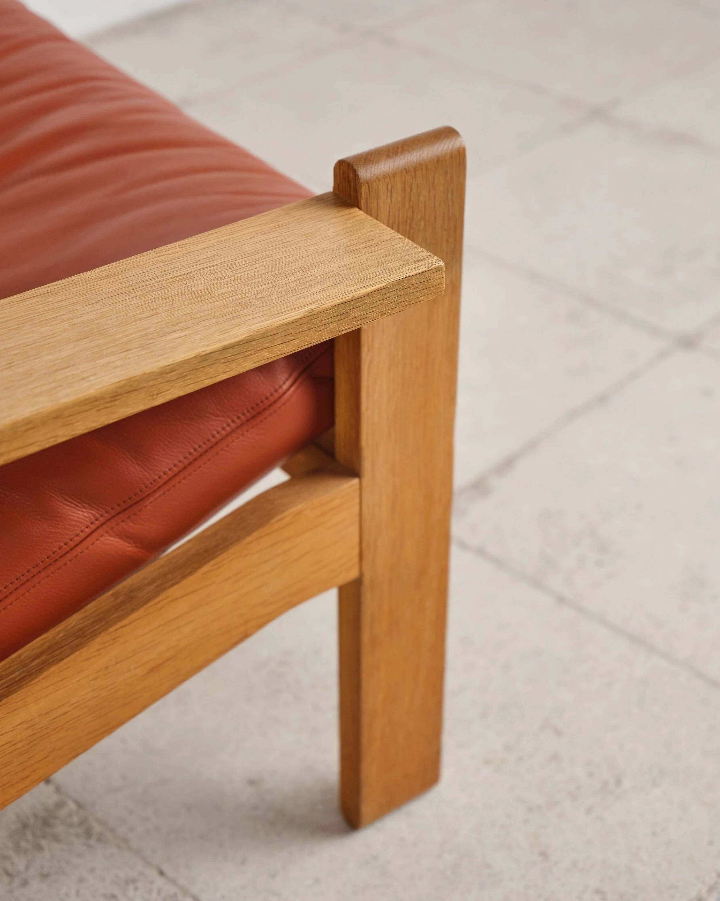 Brutalist armchair and ottoman by Tage Poulsen, Denmark, 1970s.