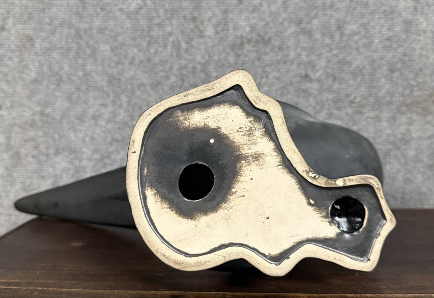 Black lacquered ceramic from the Art Deco period: bird signed Jean