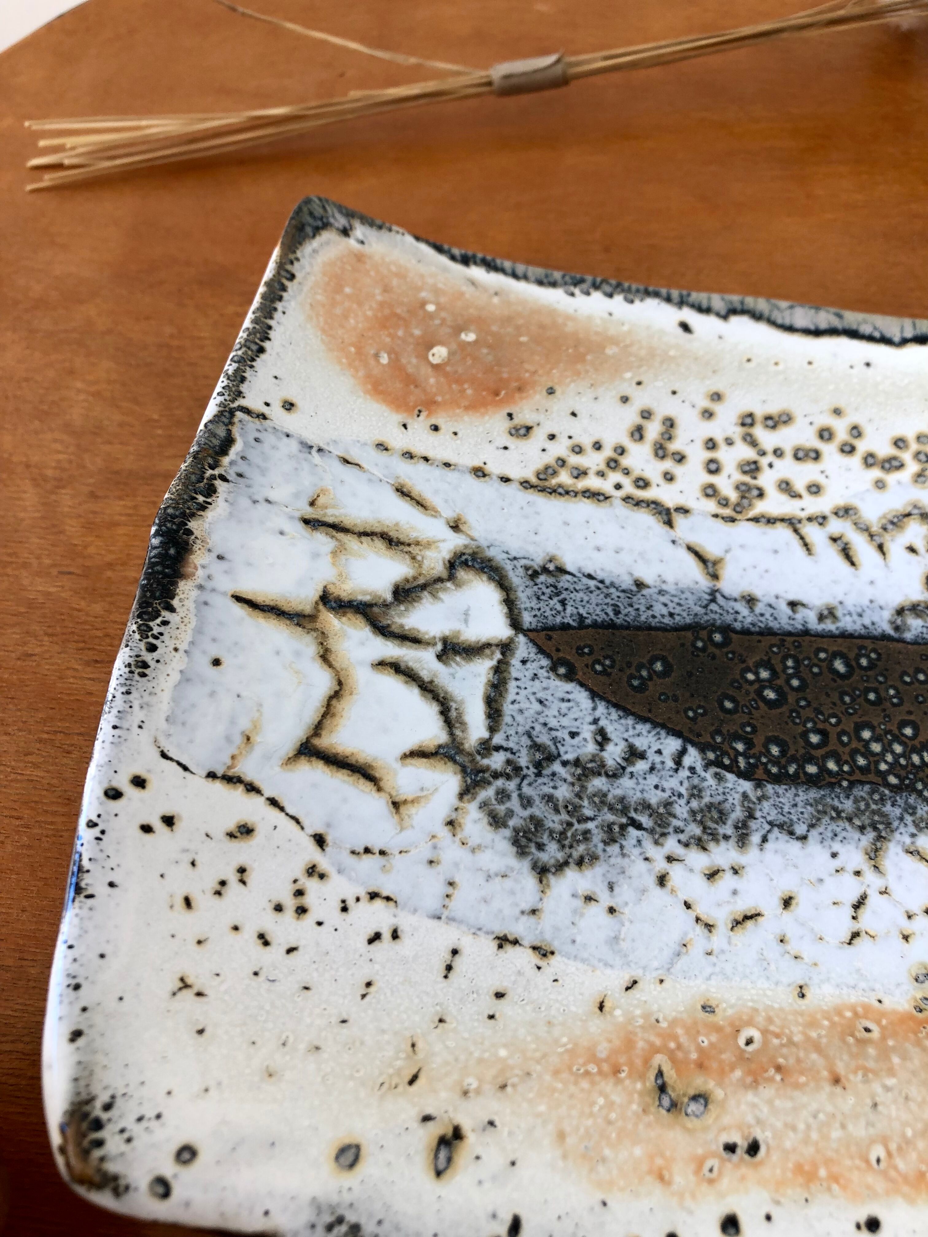 Cup in enamelled sandstone signed