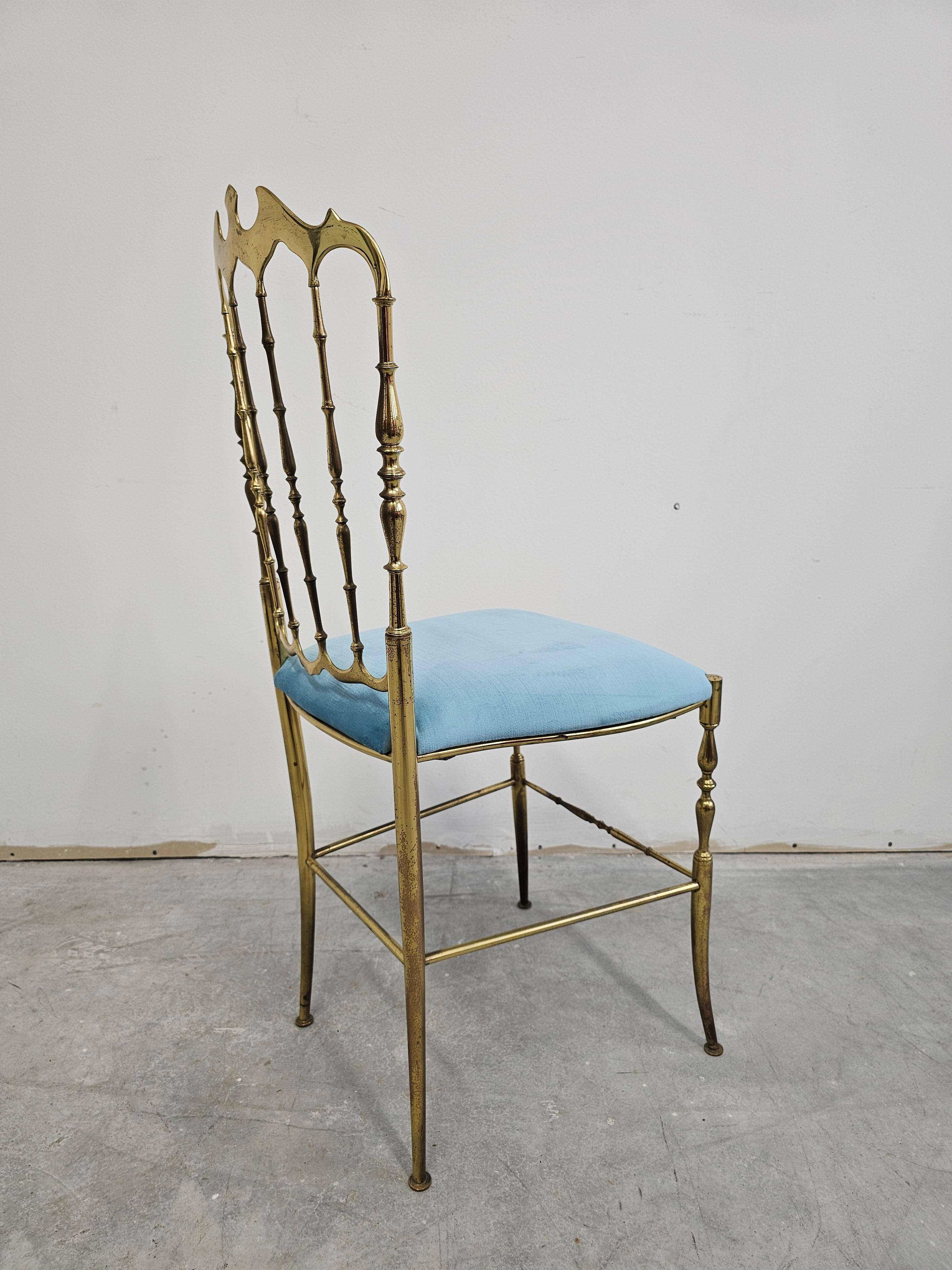 Mid-century Chiavari accent chair in solid brass with a plush seat.