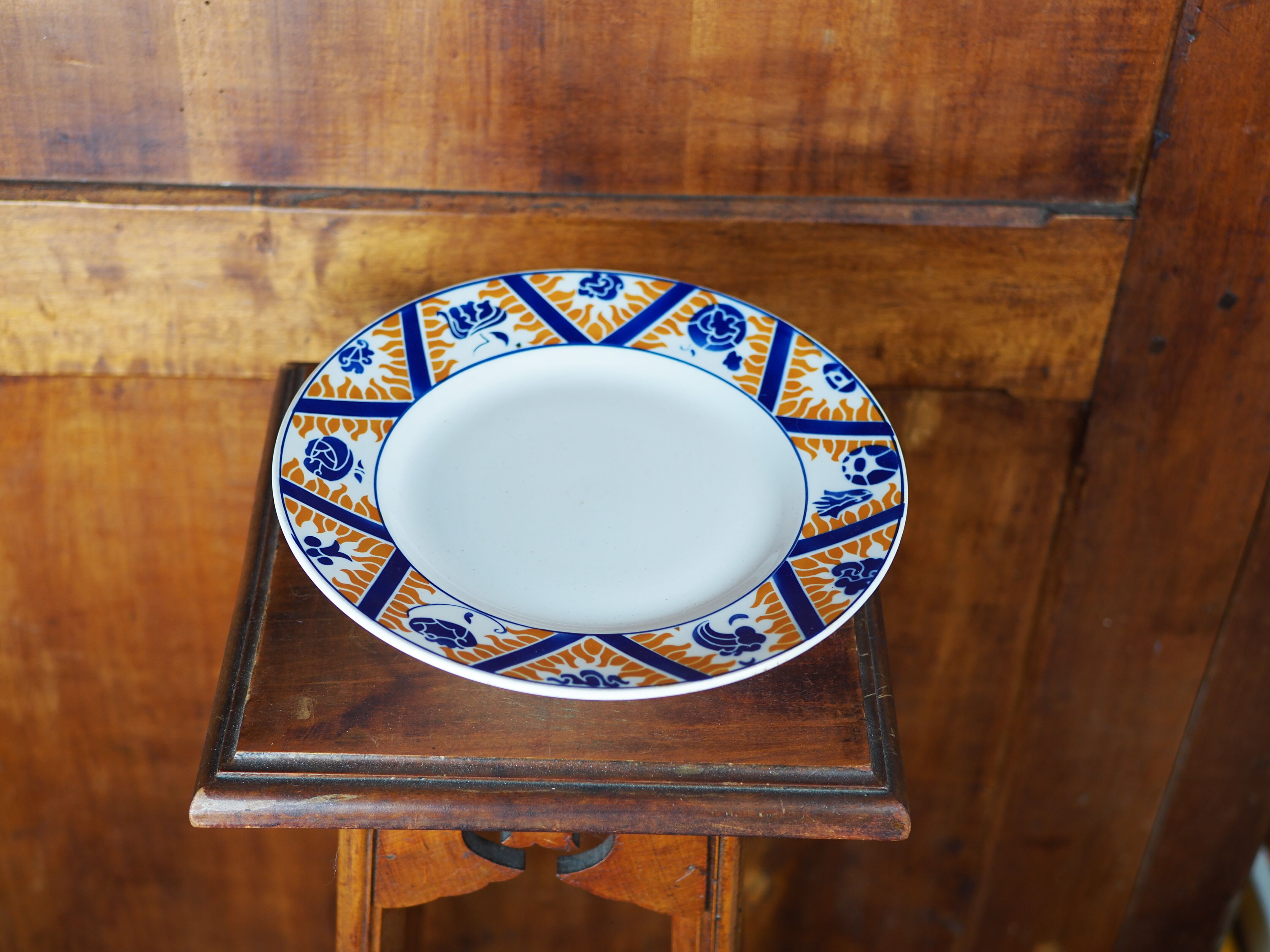 Earthenware cake dish patterned with flowers, clouds and flames, orange and blue - Orchies - 50s