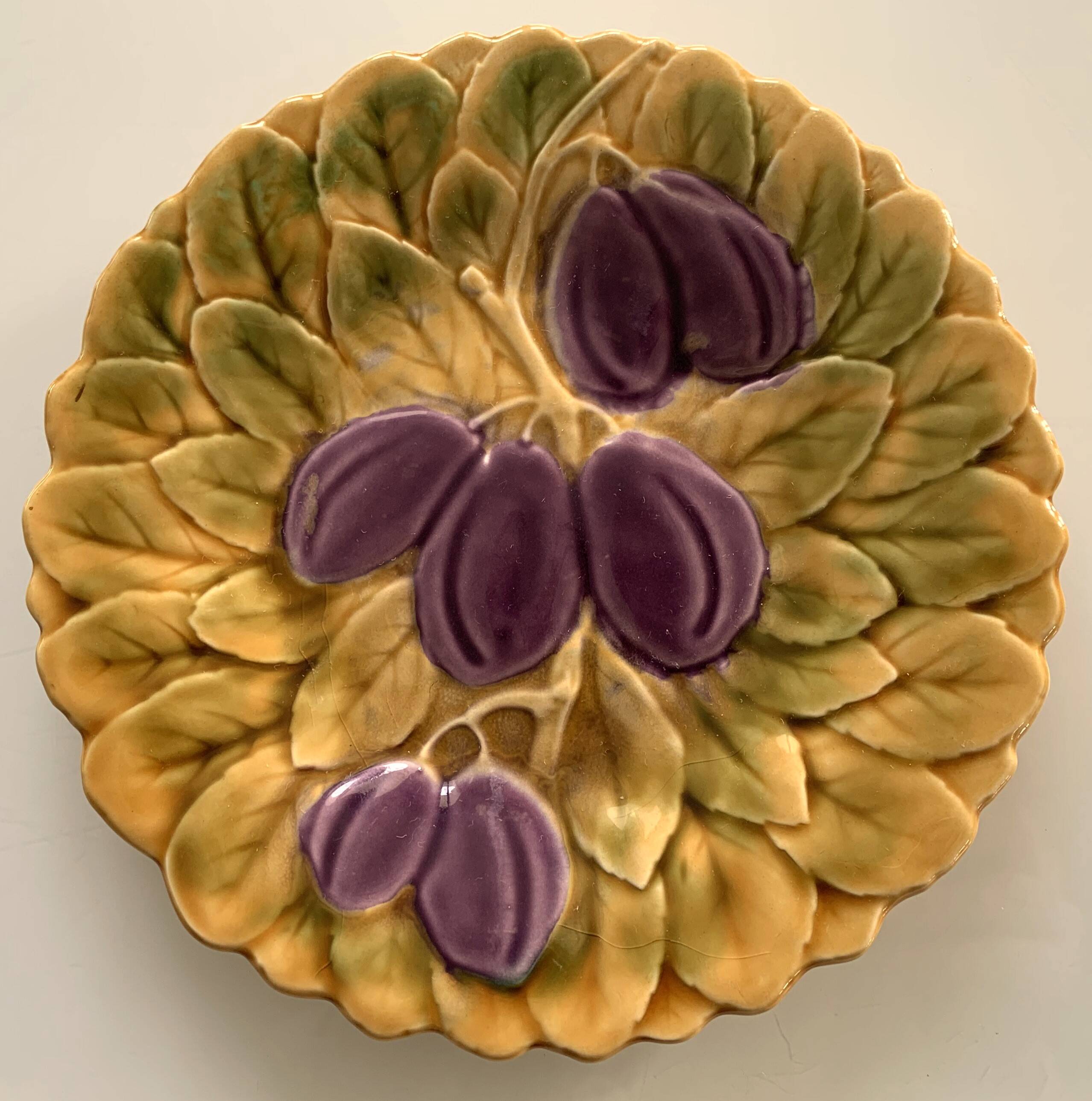 8 old Sarreguemines earthenware slip plates