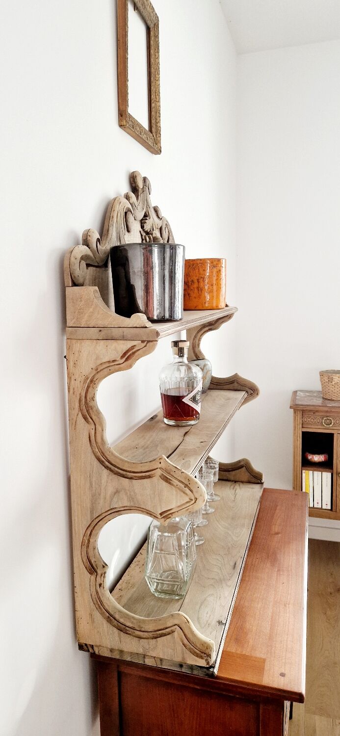Old wall shelf carved in walnut