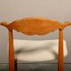 Henning Kjærnulf dining chairs set in Oak and Off White Bouclé, Denmark, 1960s