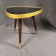 Tripode en formica repose plante