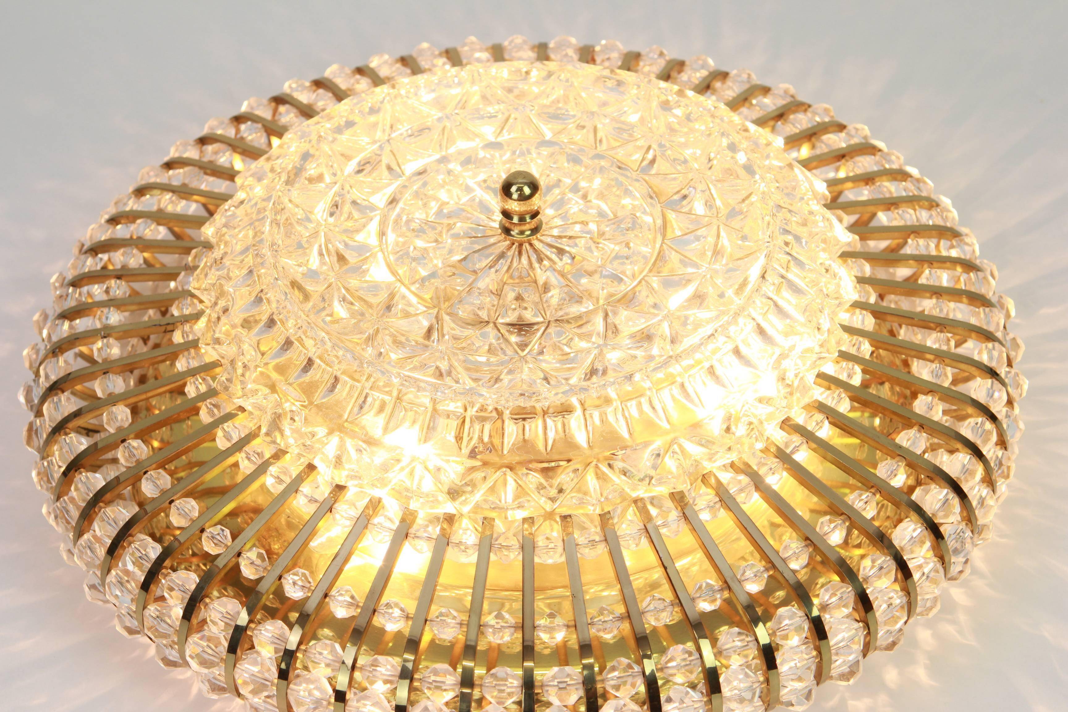 Hillebrand wall sconce in brass, glass, and Lucite beads, Germany, 1960s.