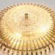 Hillebrand wall sconce in brass, glass, and Lucite beads, Germany, 1960s.