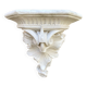 Antique wall console in patinated white plaster.