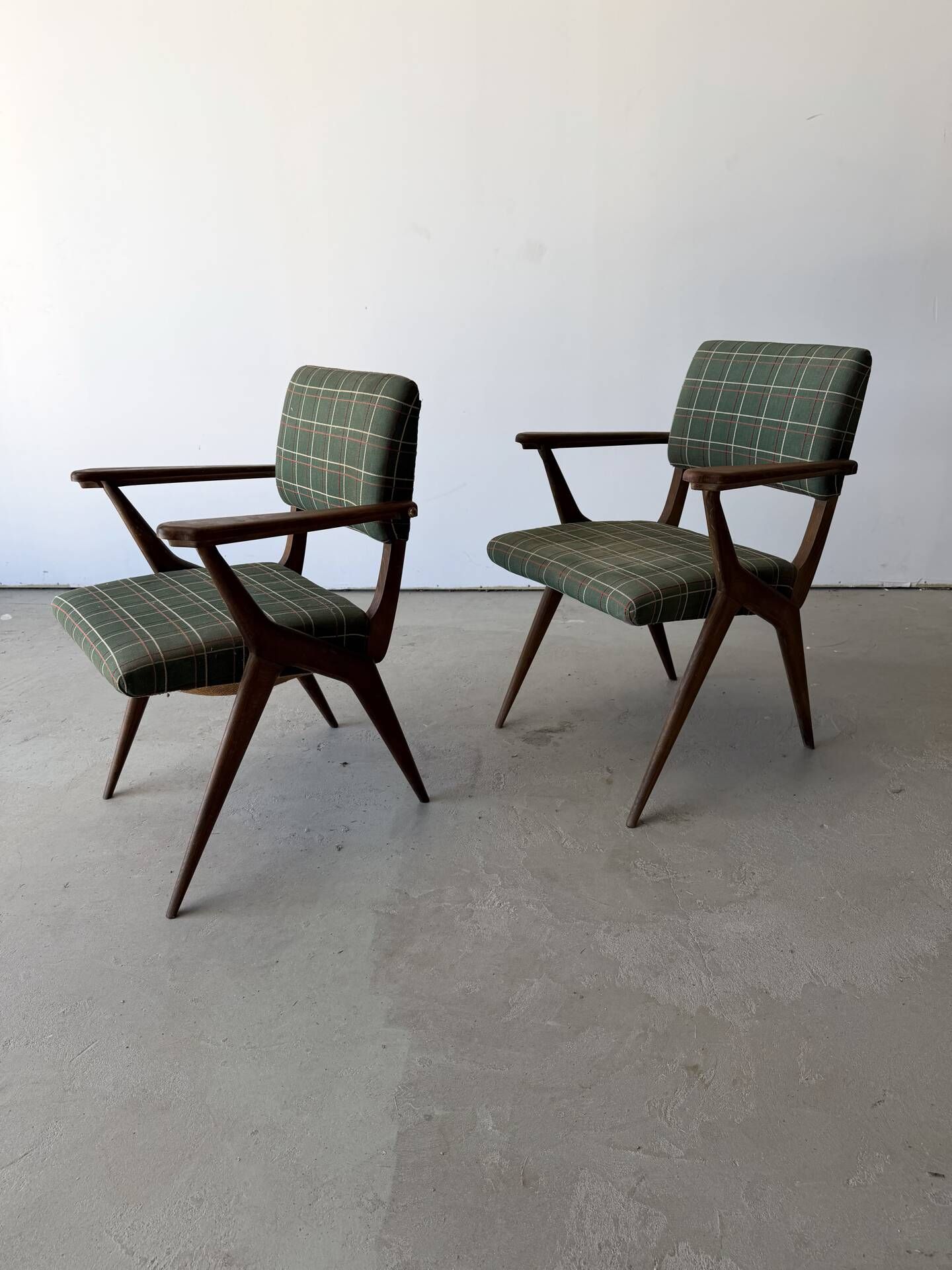 Pair of armchairs with a Scandinavian design in vintage teak from the 1960s.
