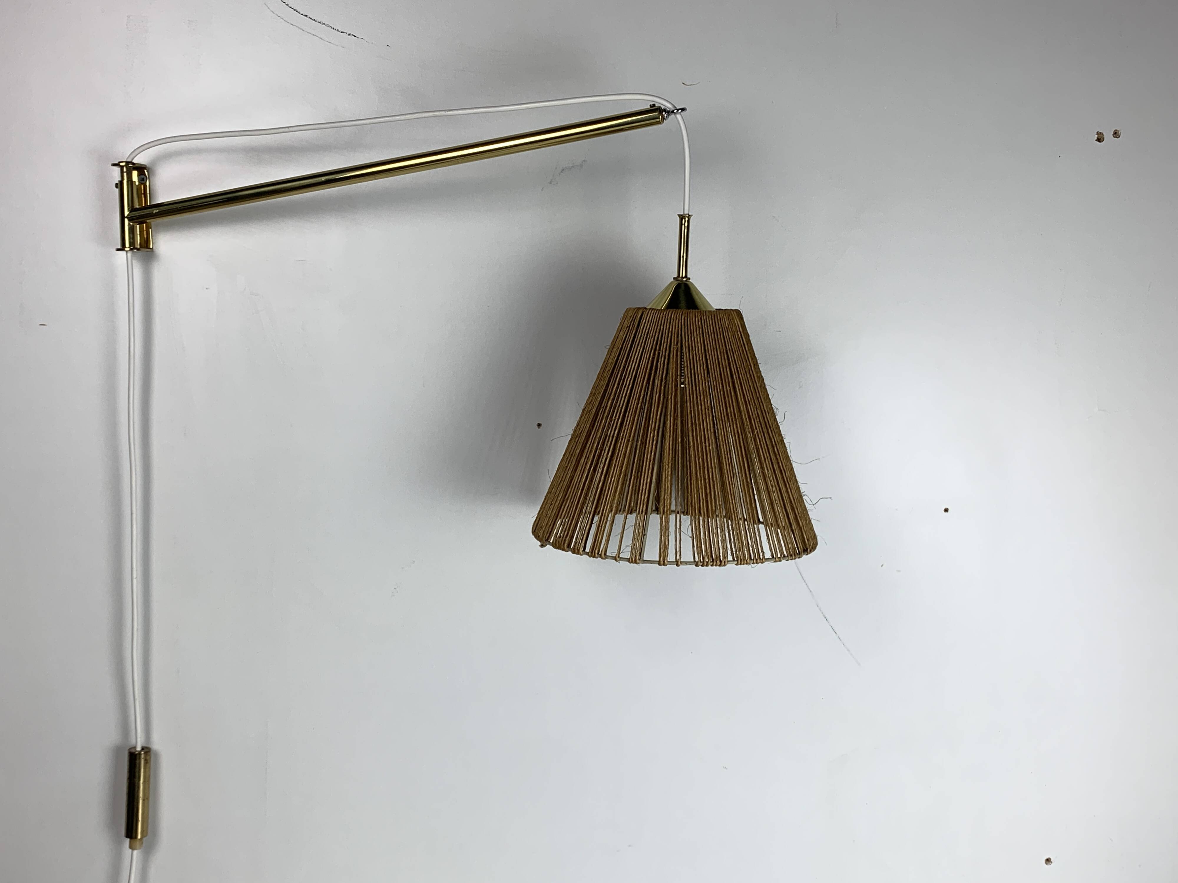 Midcentury extendable brass wall mount with cocoon and sisal shade Lars Schioler, 1960s