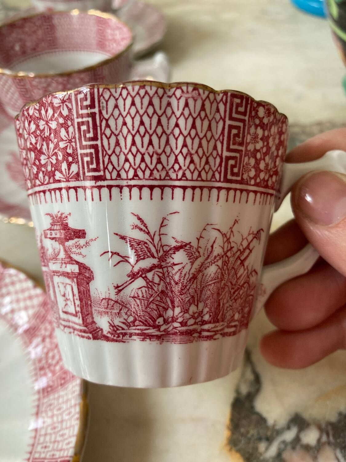 Set of 5 Lunéville “K and G” cups and saucers