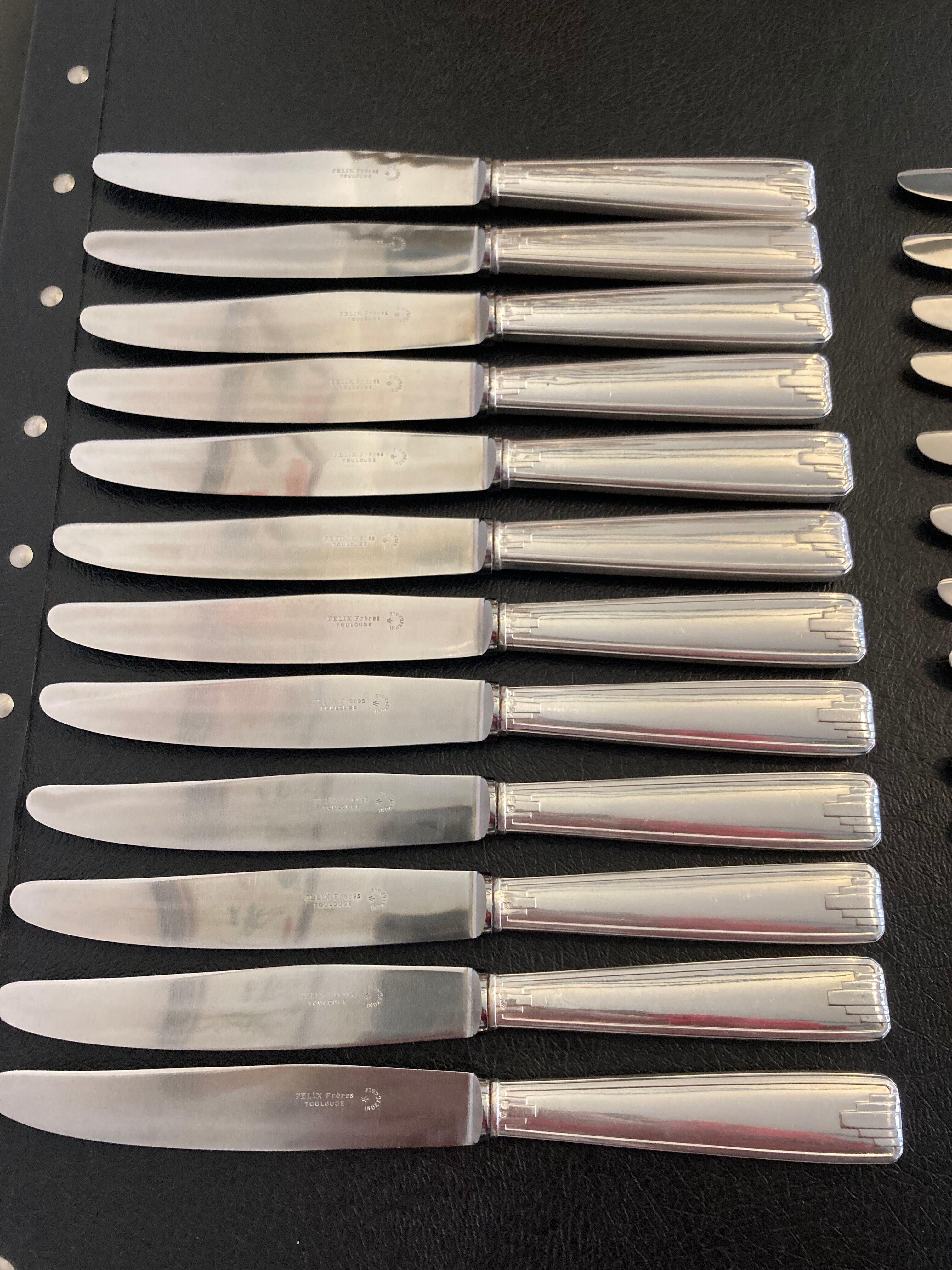 Set of 24 silver metal knives art deco
