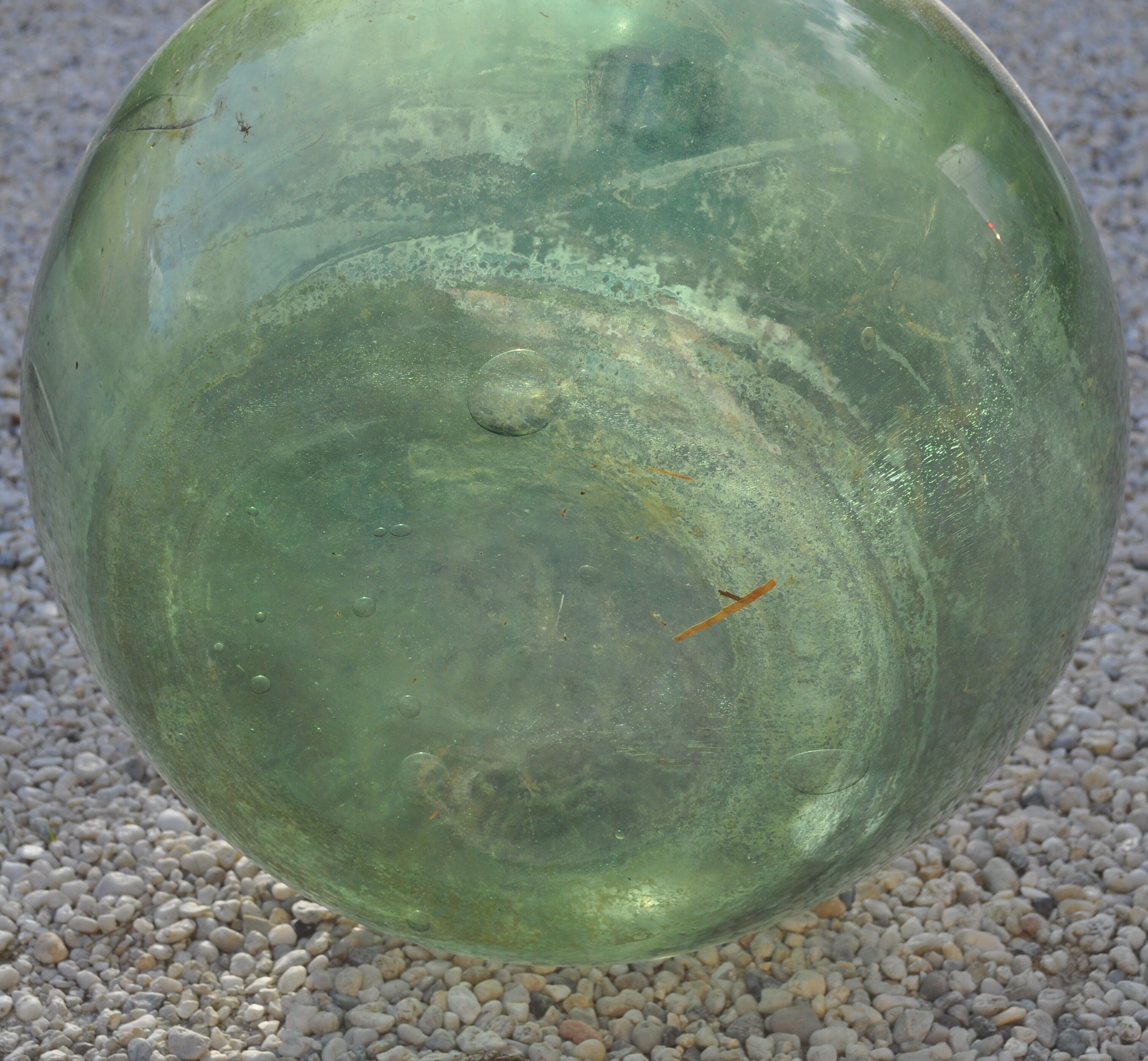 Demijohn in his iron cager