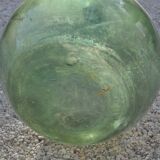 Demijohn in his iron cager