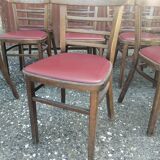 Lot de 12 chaises bistrot TON en bois et skaï rouge vintage.