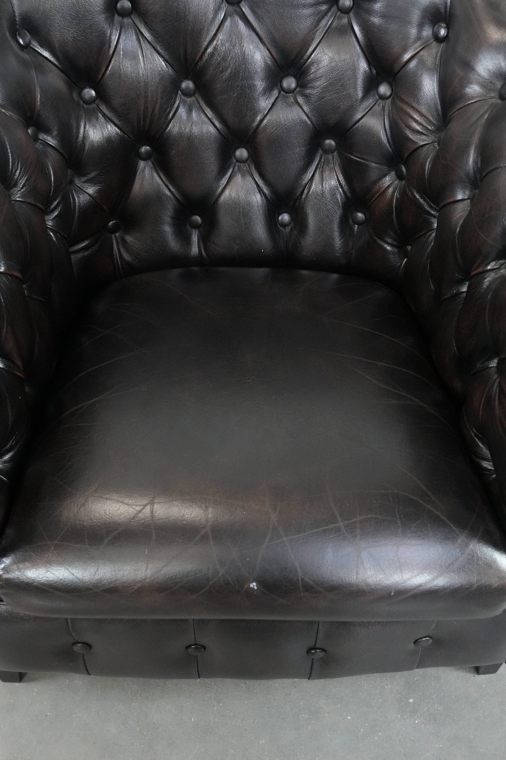 Dark luxury cowhide Chesterfield club armchair in English style
