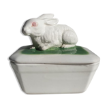 Pot terrine rabbit of Bavent in white earthenware on square of greenery