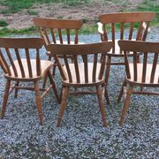 Set of 4 chairs and 1 armchair in mountain style made of oak.