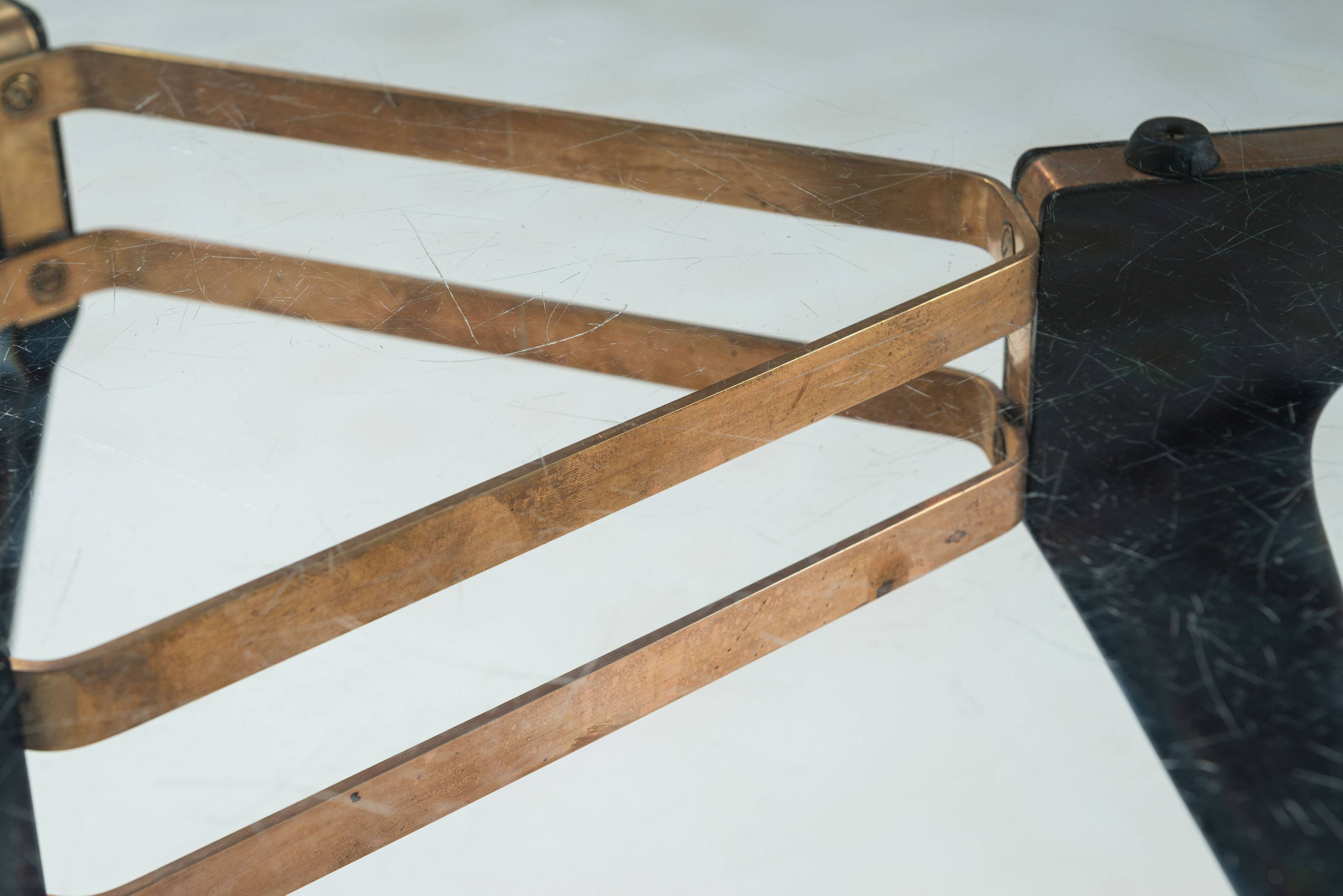 Triangular coffee table in the manner of Alfred Hendrickx