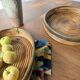 Round rattan and brass trays 1970 by Gabriella Crespi