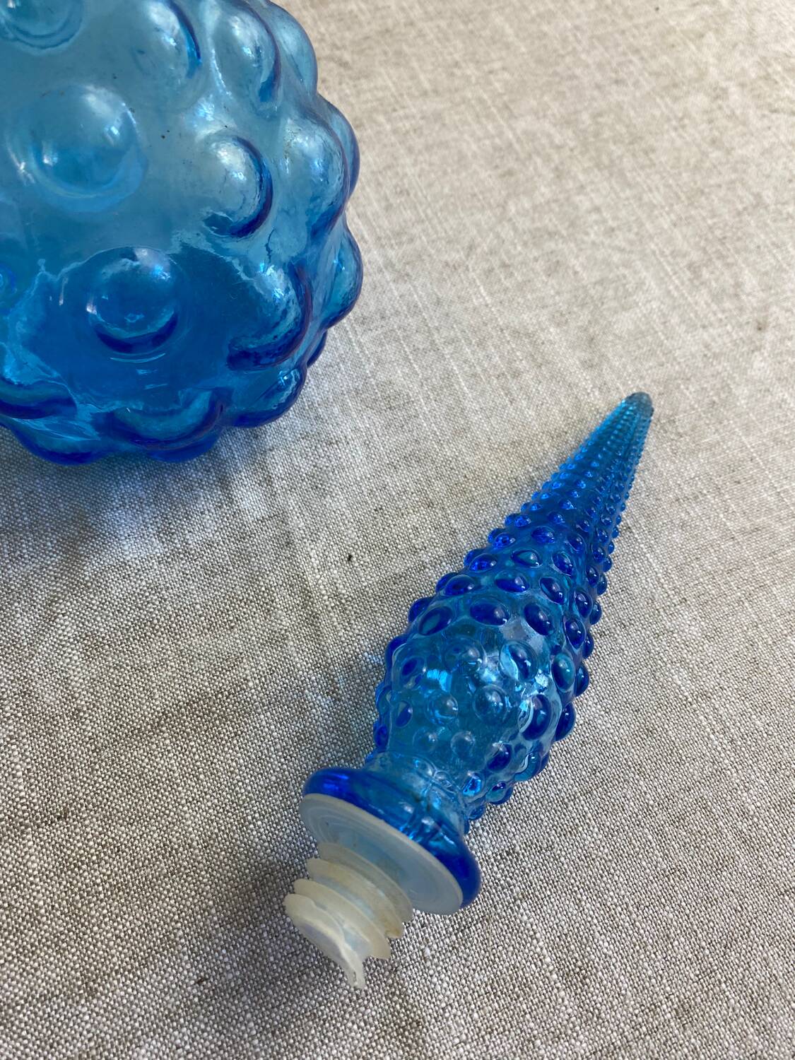 Turquoise blue employment glass carafe
