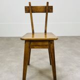 6 brutalist solid wood chairs