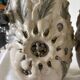 Pair of white glazed stoneware lamp bases, 20th-century floral decoration.
