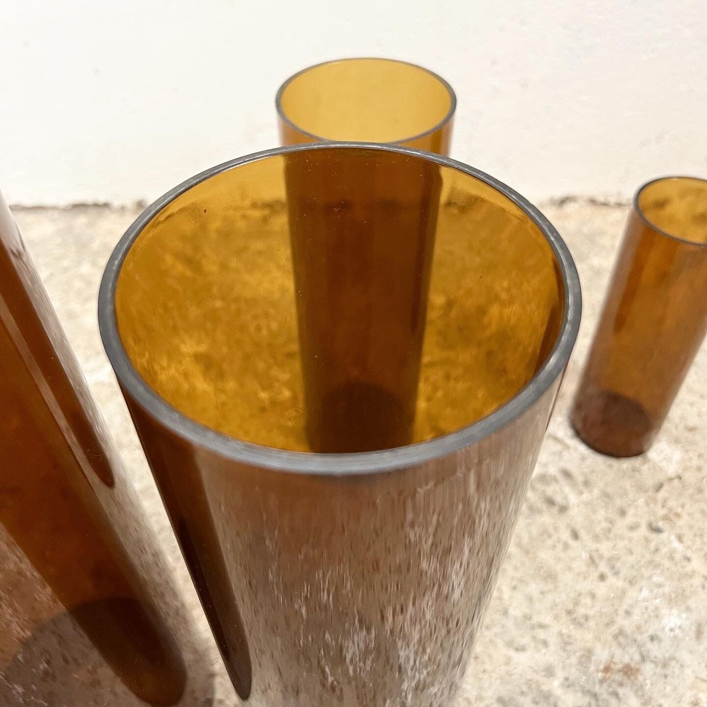 4 Jacques Bédat trundle vases in smoked plexiglass